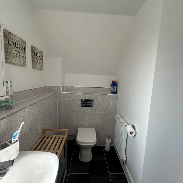 Modern bathroom suite fitted by First Call Home Services in Coventry